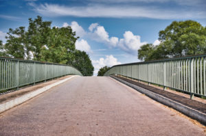 Symbolic picture, direction, where does the path lead, view to the apex of a bridge, symmetry of the picture Symbolic picture, direction, where does the path lead, view to the apex of a bridge, symmetry of the picture
