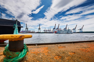 Germany, Northern Germany, Hamburg, Altona, Othmarschen, port city, seaport, Elbe, Oevelgönne museum harbor, mooring bollard with mooring line, historic paddle steamer Louisiana Star in motion, view of Container Terminal Burchardkai, Neumühlen ferry terminal Germany, Northern Germany, Hamburg, Altona, Othmarschen, port city, seaport, Elbe, Oevelgönne museum harbor, mooring bollard with mooring line, historic paddle steamer Louisiana Star in motion, view of Container Terminal Burchardkai, Neumühlen ferry terminal