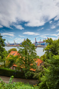 Germany, Northern Germany, port city, Hamburg, Altona, Othmarschen, Schulberg, seaport, Elbe, view from Elbchaussee over treetops and house roofs, port basin with container terminal in Waltershof, Buchardkai, portrait format Germany, Northern Germany, port city, Hamburg, Altona, Othmarschen, Schulberg, seaport, Elbe, view from Elbchaussee over treetops and house roofs, port basin with container terminal in Waltershof, Buchardkai, portrait format