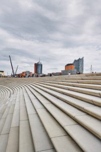 Germany, Northern Germany, port city, Hamburg, Elbe promenade, stairs, designed by Zaha Hadid, with a view of the Elbphilharmonie, portrait format Germany, Northern Germany, port city, Hamburg, Elbe promenade, stairs, designed by Zaha Hadid, with a view of the Elbphilharmonie, portrait format