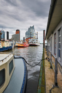Germany, Northern Germany, port city, Hamburg, seaport, Elbe, Hamburg harbor, quay of the Überseebrücke, view of Hafencity and the landmark Elbphilharmonie, portrait format Germany, Northern Germany, port city, Hamburg, seaport, Elbe, Hamburg harbor, quay of the Überseebrücke, view of Hafencity and the landmark Elbphilharmonie, portrait format