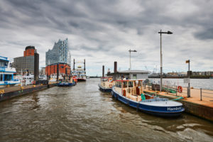 Germany, Northern Germany, port city, Hamburg, seaport, Elbe, Hamburg harbor, Überseebrücke, harbor basin, workshop ships at the pier, view of Hafencity and the landmark Elbphilharmonie Germany, Northern Germany, port city, Hamburg, seaport, Elbe, Hamburg harbor, Überseebrücke, harbor basin, workshop ships at the pier, view of Hafencity and the landmark Elbphilharmonie