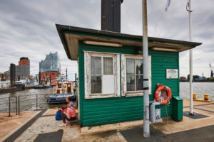 Germany, Northern Germany, port city, Hamburg, seaport, Elbe, Hamburg harbor, Überseebrücke, wooden houses on the pier, view of Hafencity and the landmark Elbphilharmonie Germany, Northern Germany, port city, Hamburg, seaport, Elbe, Hamburg harbor, Überseebrücke, wooden houses on the pier, view of Hafencity and the landmark Elbphilharmonie