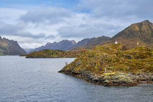 Cruise along the coast of Norway, Lofoten archipelago, entrance to Raftsundet, island with signal tower