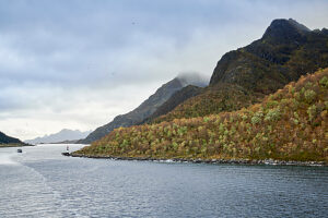 Cruise along the coast of Norway, Lofoten archipelago, Raftsundet landscape, mountain peaks in clouds
