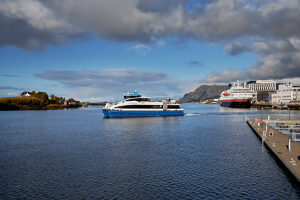 Cruise on the coast of Norway, Vega Archipelago, town of Brønnøysund at the center of the Norwegian coast, departure of a catamaran ferry from the harbor