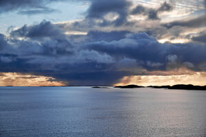 Cruise along the coast of Norway, sunset in the Vega Archipelago, spectacular cloud formation