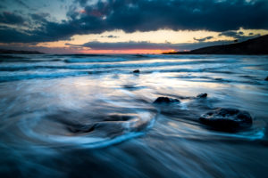 Wild sunset at the beach in winter season. Artistic landscape with sun and sea water. Beautiful concept of travel and adventure alternative vacation. Colors and background with water Wild sunset at the beach in winter season. Artistic landscape with sun and sea water. Beautiful concept of travel and adventure alternative vacation. Colors and background with water