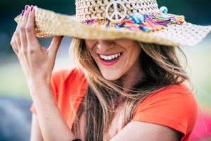 Smile and perfect teeth beautiful young woman laughing and enjoying outdoor - trendy hat and fashion caucasian female portrait - happiness and joyful people concept lifestyle Smile and perfect teeth beautiful young woman laughing and enjoying outdoor - trendy hat and fashion caucasian female portrait - happiness and joyful people concept lifestyle