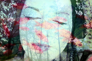 Portrait of a woman overlaid with branches and flowers,