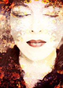 Portrait of a woman overlaid with branches and flowers,