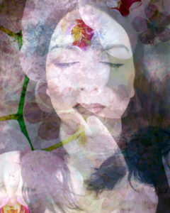Portrait of a woman overlaid with blossoms