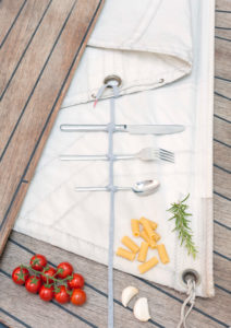 Ship deck, teak, sail, cutlery, knife fork, spoon, tomato, garlic, vegetables, rosemary, noodles, Ship deck, teak, sail, cutlery, knife fork, spoon, tomato, garlic, vegetables, rosemary, noodles,
