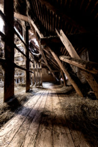 Narrow walk of a hayloft on a farm
