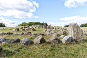 Stone tombs on green meadow near Lindholm Høje, Aalborg