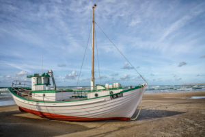 Denmark, Lokken, fishing boat on the beach