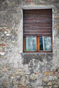 Window, wooden shutter, half-opened, curtains, old stone wall, house wall, Tuscany, Italy Window, wooden shutter, half-opened, curtains, old stone wall, house wall, Tuscany, Italy