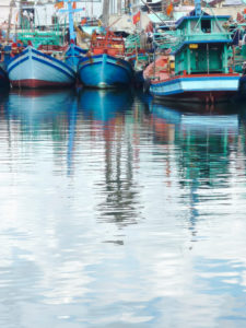 Fishing boats, reflection in the water, harbour, Ph∑ Quoc, Vietnam Fishing boats, reflection in the water, harbour, Ph∑ Quoc, Vietnam