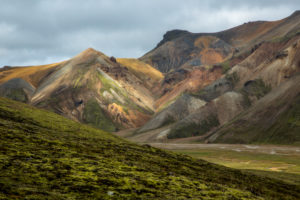 Iceland, Landmannalaugar, rhyolite mountains, green moss in front of colored mountains, light mood Iceland, Landmannalaugar, rhyolite mountains, green moss in front of colored mountains, light mood