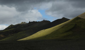 Iceland, landscape at the Alftavatn, evening light, black clouds and sunshine Iceland, landscape at the Alftavatn, evening light, black clouds and sunshine