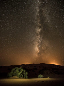 Starry sky with Milky Way above the desert with Erfoud, Sand desert Erg Chebbi, Morocco Starry sky with Milky Way above the desert with Erfoud, Sand desert Erg Chebbi, Morocco
