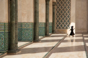 Girl runs in the vestibule of the Hassan-II. Mosque, Casablanca, Morocco Girl runs in the vestibule of the Hassan-II. Mosque, Casablanca, Morocco