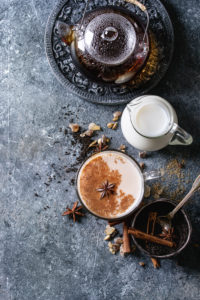 Vintage blue pot of traditional indian masala chai tea with