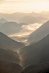 Valley in the mountains with morning fog Valley in the mountains with morning fog