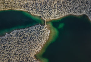 Aerial view of the bridge at Untersee (Eibsee), snow-covered trees, turquoise water, beginning of winter, Eibsee, Grainau, Garmisch-Partenkirchen, Upper Bavaria, Bavaria, southern Germany, Germany Aerial view of the bridge at Untersee (Eibsee), snow-covered trees, turquoise water, beginning of winter, Eibsee, Grainau, Garmisch-Partenkirchen, Upper Bavaria, Bavaria, southern Germany, Germany
