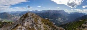 Panoramic photo from the Kramer summit with a view over Garmisch-Partenkirchen and Grainau, Ester Mountains, Karwendel Mountains and Wetterstein Mountains (with Alpspitze and Zugspitze) and Ammergau Alps, blue sky, clouds, rock, summit cross, Garmisch-Partenkirchen, Upper Bavaria, Bavaria, southern Germany, Germany Panoramic photo from the Kramer summit with a view over Garmisch-Partenkirchen and Grainau, Ester Mountains, Karwendel Mountains and Wetterstein Mountains (with Alpspitze and Zugspitze) and Ammergau Alps, blue sky, clouds, rock, summit cross, Garmisch-Partenkirchen, Upper Bavaria, Bavaria, southern Germany, Germany