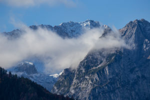 Clouds of mist envelop Waxensteine and Höllental as well as Zugspitze, Wetterstein Mountains, blue sky, fog, clouds, Garmisch-Partenkirchen, Upper Bavaria, Bavaria, southern Germany, Germany Clouds of mist envelop Waxensteine and Höllental as well as Zugspitze, Wetterstein Mountains, blue sky, fog, clouds, Garmisch-Partenkirchen, Upper Bavaria, Bavaria, southern Germany, Germany