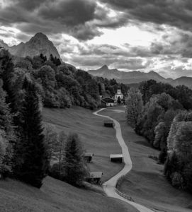 Kirchdorf Wamberg with St. Anna's Church above Garmisch-Partenkirchen in autumn, Bauernstadel, promenade, trees, clouds, Garmisch-Partenkirchen, Upper Bavaria, Bavaria, southern Germany, Germany Kirchdorf Wamberg with St. Anna's Church above Garmisch-Partenkirchen in autumn, Bauernstadel, promenade, trees, clouds, Garmisch-Partenkirchen, Upper Bavaria, Bavaria, southern Germany, Germany