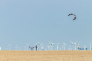 Relaxation on the Wadden Sea and on the beach of St. Peter Ording, North Sea with a view of the wind turbines on the horizon. Relaxation on the Wadden Sea and on the beach of St. Peter Ording, North Sea with a view of the wind turbines on the horizon.