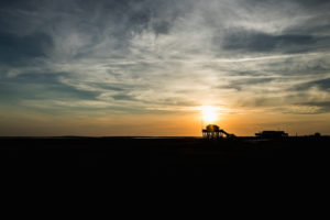 Colorful sunset on the North Sea - in the backlight of the sun a typical stilt house, pile dwellings, pile dwellings that defy the tides. Colorful sunset on the North Sea - in the backlight of the sun a typical stilt house, pile dwellings, pile dwellings that defy the tides.