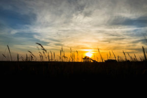 Colorful sunset on the North Sea - in the backlight of the sun a typical stilt house, pile dwellings, pile dwellings that defy the tides. Colorful sunset on the North Sea - in the backlight of the sun a typical stilt house, pile dwellings, pile dwellings that defy the tides.