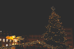 The Augsburger Christkindlesmarkt, Christmas market in Swabia at night. The Christmas tree and the Christmas pyramid, pyramid of lights