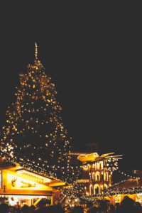 The Augsburger Christkindlesmarkt, Christmas market in Swabia at night. The Christmas tree and the Christmas pyramid, pyramid of lights.