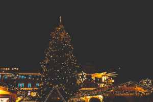 The Augsburger Christkindlesmarkt, Christmas market in Swabia at night. The Christmas tree and the Christmas pyramid, pyramid of lights.