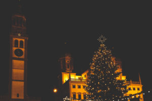 The Christmas tree at the Augsburg Christkindlesmarkt, Christmas market in Swabia at night.