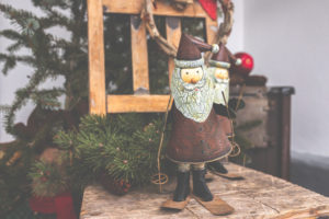 Decoration, object: a vintage style skier on a chair in a decoration for Christmas ..