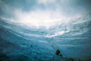 Snow storm, blowing snow on mountain in Scotland Snow storm, blowing snow on mountain in Scotland