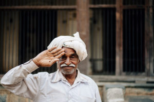 security guard on the camping site in Palitana, India security guard on the camping site in Palitana, India
