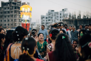 Women while dancing on the street during an Indian wedding, Vadodara Women while dancing on the street during an Indian wedding, Vadodara