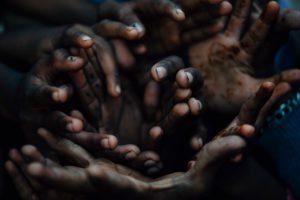 Indian children play with her hands Indian children play with her hands