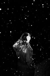 Woman with snowflakes at night Woman with snowflakes at night