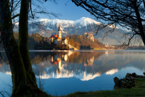 Slovenia, Upper Carniola, Bled, Assumption of Mary Church reflected in Lake Bled Slovenia, Upper Carniola, Bled, Assumption of Mary Church reflected in Lake Bled