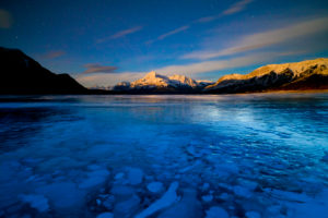 Canada, Alberta, Abraham Lake, Elliot Peak, Night, Stars, Bubbles in the Ice Canada, Alberta, Abraham Lake, Elliot Peak, Night, Stars, Bubbles in the Ice
