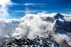 2 climbers, summit rise, Hoher Riffler, Hintertux, Zillertal Alps, Austria 2 climbers, summit rise, Hoher Riffler, Hintertux, Zillertal Alps, Austria