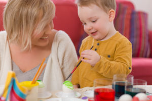 Mother, toddler, Painting Easter eggs, happy Mother, toddler, Painting Easter eggs, happy