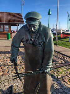 Maasholm, village, Baltic Sea, coast, fisherman, boat, harbor, bronze statue, Northern Germany, Schlei, Schleswig-Holstein, Germany